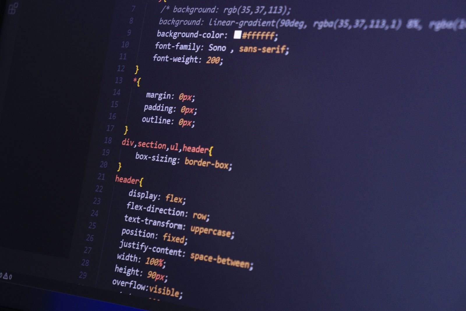 A dark code editor filling the frame with a stylesheet open